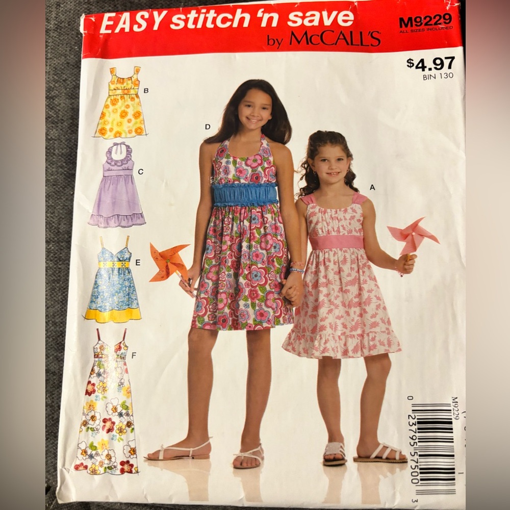 McCall’s M9229 Girls' Pink Floral Halter Sundress - Easy Stitch 'n Save uncut